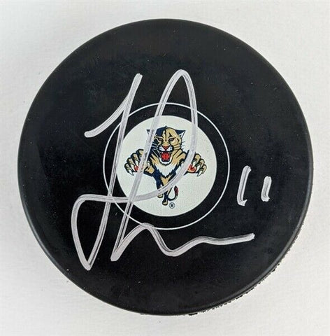 Jonathan Huberdeau Signed Florida Panthers Logo Hockey Puck (JSA COA)