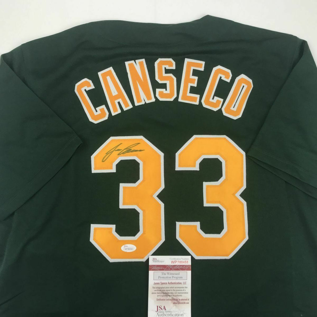 Autographed/Signed JOSE CANSECO Oakland Dark Green Baseball Jersey