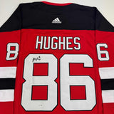 Autographed/Signed Jack Hughes New Jersey Devils Red Hockey Jersey Fanatics COA