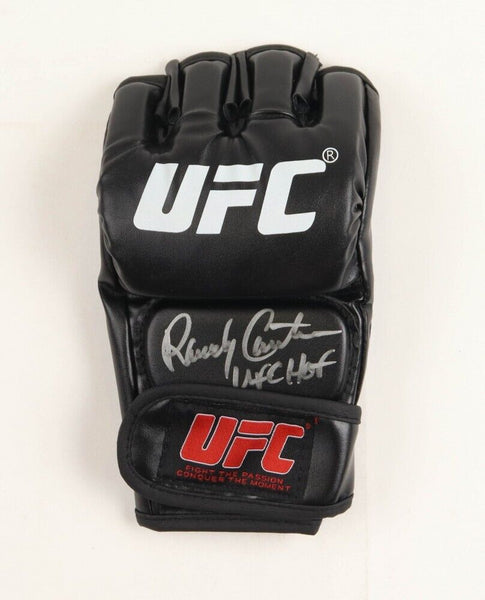 Randy Couture Signed UFC Glove (JSA) MMA Record 19 - 11 / 3xHeavy Weight Champ