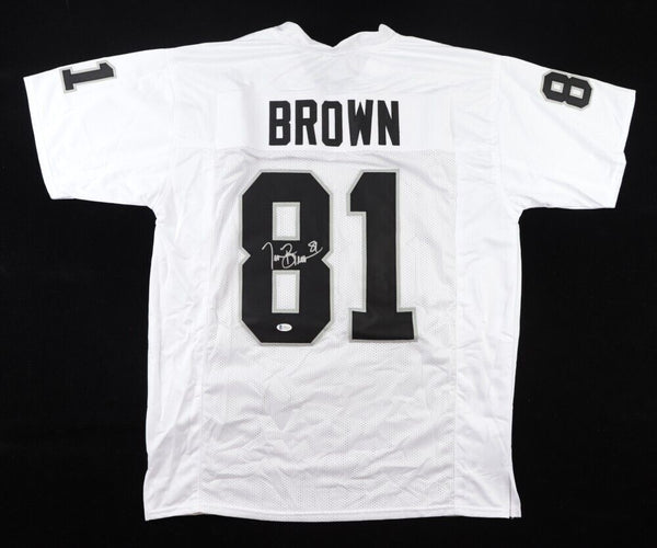 Tim Brown Signed Oakland Raiders Jersey (Beckett COA) 9xPro Bowl Wide Receiver