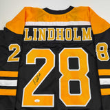 Autographed/Signed Elias Lindholm Boston Black Hockey Jersey JSA COA