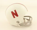 Johnny Rodgers Signed Nebraska Cornhuskers Mini Helmet "Heisman 72." (PSA COA)