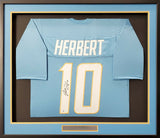 CHARGERS JUSTIN HERBERT AUTOGRAPHED FRAMED POWDER BLUE JERSEY BECKETT 191176