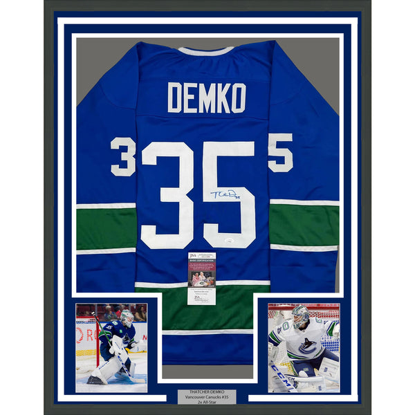Framed Autographed/Signed Thatcher Demko 35x39 Vancouver Blue Jersey JSA COA