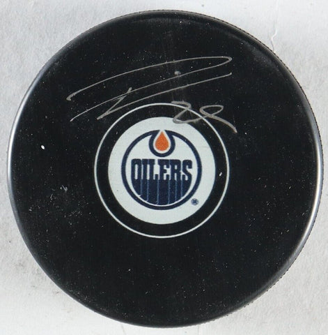 Leon Draisaitl Signed Edmonton Oilers Logo Puck (Fanatics) 4xAll Star Left Wing