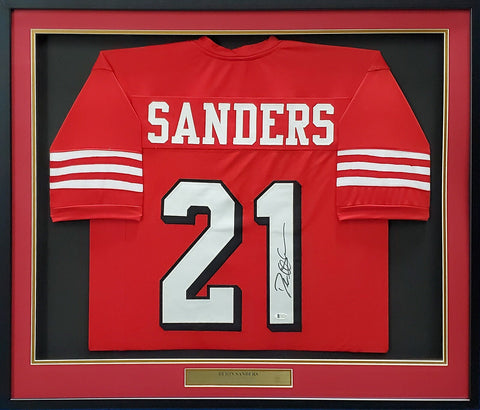 SAN FRANCISCO 49ERS DEION SANDERS AUTOGRAPHED FRAMED RED JERSEY BECKETT 200412