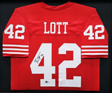 49ERS RONNIE LOTT AUTOGRAPHED SIGNED FRAMED RED JERSEY BECKETT WITNESS 214095