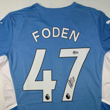 Autographed/Signed Phil Foden Manchester City Blue Soccer Jersey Beckett BAS COA