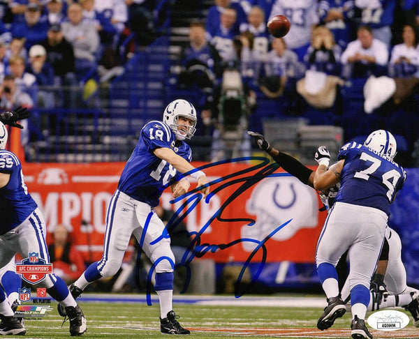 Peyton Manning Signed Colts Blue Jersey Passing Action 8x10 Photo - (JSA COA)