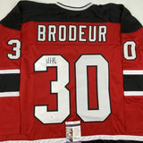 Autographed/Signed Martin Marty Brodeur New Jersey Red Jersey JSA COA