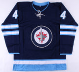 Josh Morrissey Signed Jets Jersey (Beckett COA) Playing career 2013-present