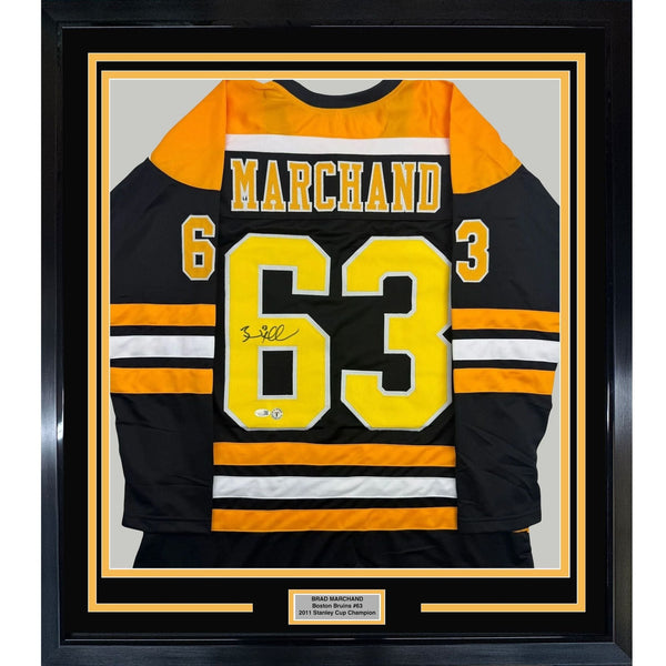 Framed Autographed/Signed Brad Marchand 35x39 Boston Black Jersey JSA COA