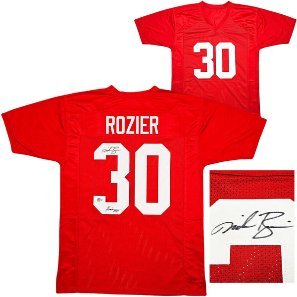 NEBRASKA MIKE ROZIER AUTOGRAPHED RED JERSEY "HEISMAN 1983" BECKETT QR 212608
