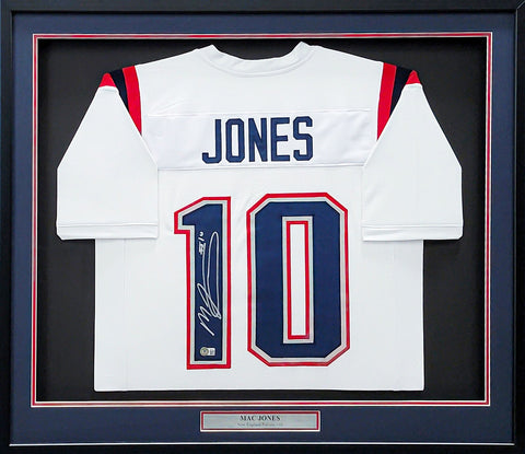 NEW ENGLAND PATRIOTS MAC JONES AUTOGRAPHED FRAMED WHITE JERSEY BECKETT QR 202404