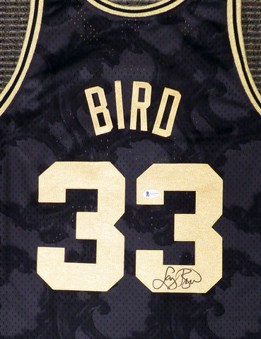 CELTICS LARRY BIRD AUTOGRAPHED BLACK M&N GOLD TOILE JERSEY XXL BECKETT 177717