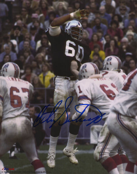 Otis Sistrunk Signed Raiders vs Patriots Action 8x10 Photo - (SCHWARTZ COA)