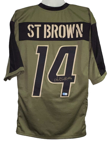 AMON-RA ST BROWN SIGNED DETROIT LIONS #14 SALUTE TO SERVICE JERSEY BECKETT