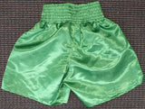 FLOYD MAYWEATHER JR. AUTOGRAPHED GREEN BOXING TRUNKS "TBE" BECKETT BAS 159664