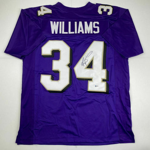 Autographed/Signed RICKY WILLIAMS Baltimore Purple Football Jersey Beckett COA