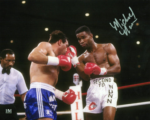 Michael Nunn Signed Boxing Punching Action 8x10 Photo - (SCHWARTZ SPORTS COA)