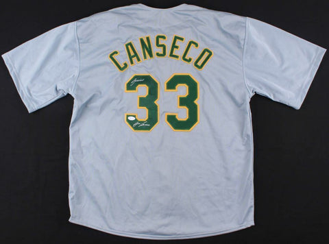 Jose Canseco Signed Athletics Jersey (JSA COA) 2xWorld Series champ / 1989, 2000