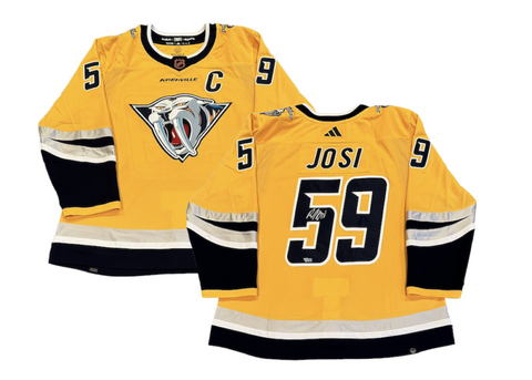 Josi sporting the on-ice Retro Reverse jersey. : r/Predators