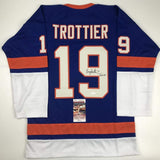 Autographed/Signed Bryan Trottier HOF 97 New York Blue Jersey JSA COA