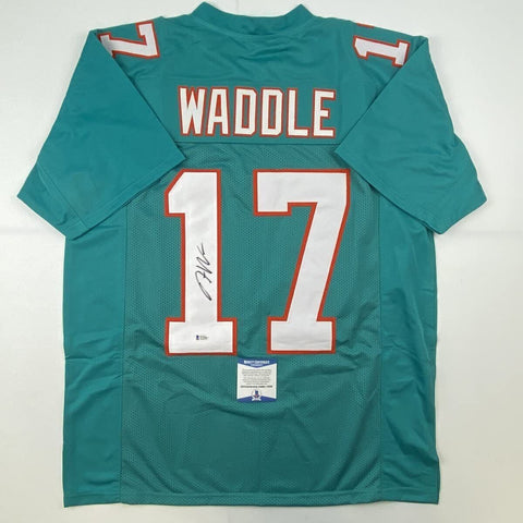 Autographed/Signed Jaylen Waddle Miami Teal Football Jersey Beckett BAS COA