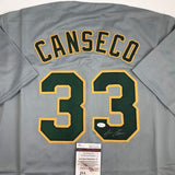 Autographed/Signed JOSE CANSECO Oakland Grey Baseball Jersey JSA COA Auto