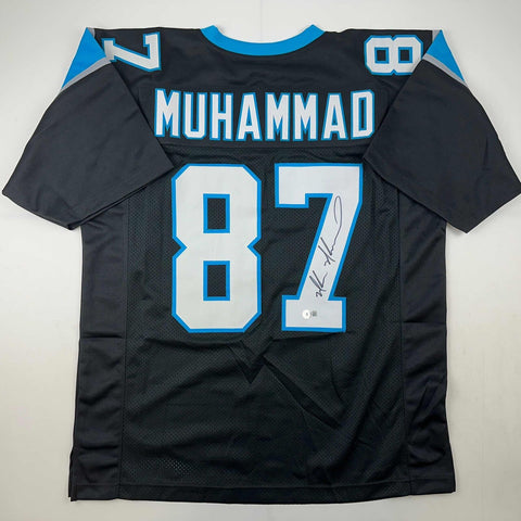 Autographed/Signed Muhsin Muhammad Carolina Black Jersey Beckett BAS COA