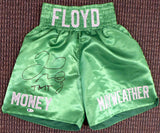 FLOYD MAYWEATHER JR. AUTOGRAPHED GREEN BOXING TRUNKS "TMT" BECKETT BAS 159663