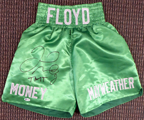 FLOYD MAYWEATHER JR. AUTOGRAPHED GREEN BOXING TRUNKS "TMT" BECKETT BAS 159663