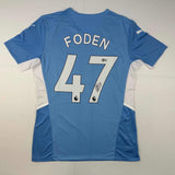 Autographed/Signed Phil Foden Manchester City Blue Soccer Jersey Beckett BAS COA