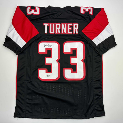 Autographed/Signed Michael Turner Atlanta Black Football Jersey Beckett BAS COA