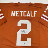 Autographed/Signed Eric Metcalf Texas Orange College Jersey Beckett BAS COA