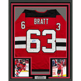 Framed Autographed/Signed Jesper Bratt 35x39 Red Hockey Jersey Beckett BAS COA