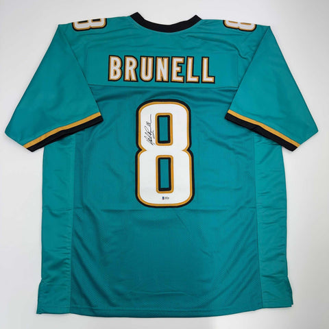 Autographed/Signed Mark Brunell Jacksonville Teal Jersey Beckett BAS COA