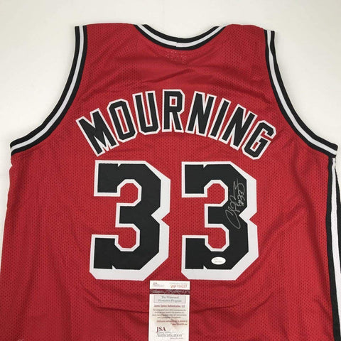 Autographed/Signed Alonzo Mourning Miami Red Basketball Jersey JSA COA