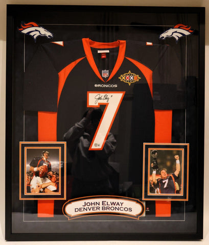 John Elway Signed Dark Blue Jersey in Deluxe Frame 39.5"x33.5" Beckett COA