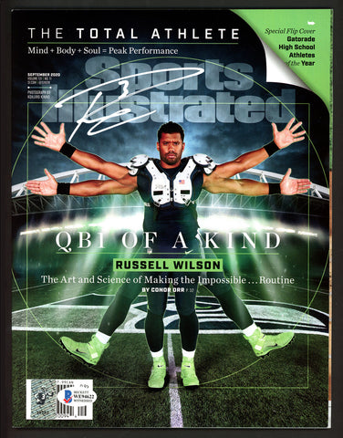 RUSSELL WILSON AUTOGRAPHED SPORTS ILLUSTRATED SEAHAWKS IN WHITE BECKETT 182296