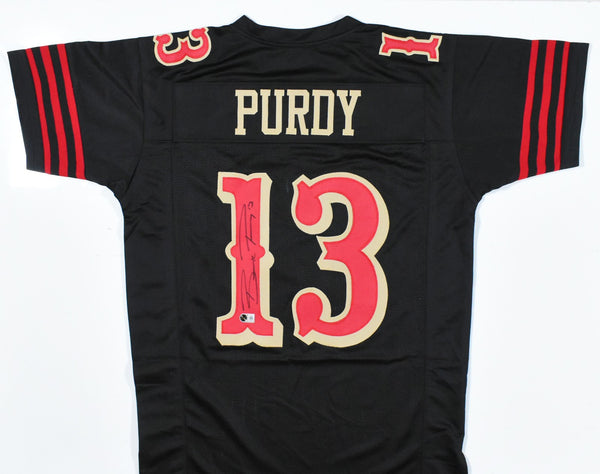 Brock Purdy Autographed Black Pro Style Jersey - Beckett W Hologram *Black