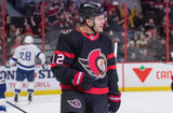 Alex DeBrincat Signed Ottawa Senators Logo Hockey Puck (JSA COA) 2022 All Star