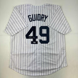 Autographed/Signed Ron Guidry New York Pinstripe Jersey Beckett BAS COA