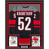 Framed Autographed/Signed Pyotr Kochetkov 35x39 Carolina Black Jersey JSA COA