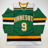 Autographed/Signed Mike Modano Minnesota Green Hockey Jersey Beckett BAS COA