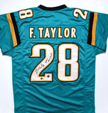 Fred Taylor Autographed Teal Pro Style Jersey w/11,695 Rush Yds. -Beckett W Holo