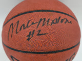 Moses Malone Autographed NBA Leather Basketball 76ers, Rockets JSA #AV29209