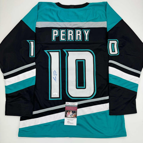 Autographed/Signed Corey Perry Anaheim Black Retro Hockey Jersey JSA COA