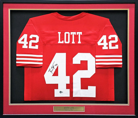 49ERS RONNIE LOTT AUTOGRAPHED SIGNED FRAMED RED JERSEY BECKETT WITNESS 214095